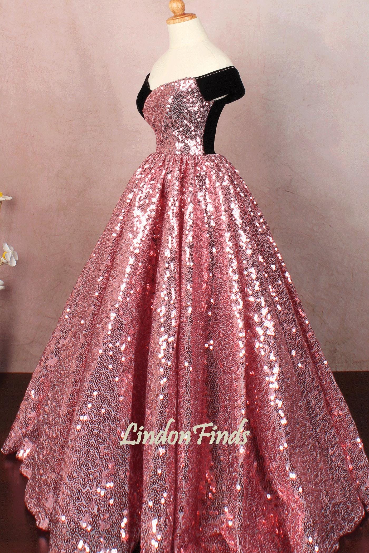 pink and black sparkly dress Black Sequined Pink Bow Fit And Flare Formal Gown