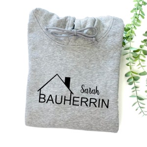 Einzugsgeschenk Bauherrin Hoodie Haus | optional mit Koordinaten | Geschenk zum Einzug, Richtfest, Hausbau, Umzug | Bauherrin Pullover