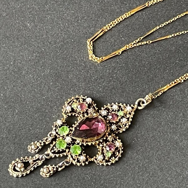 Vintage rhinestone and gold tone violet / purple, green paste and white faux pearl fleur de lys design pendant and chain