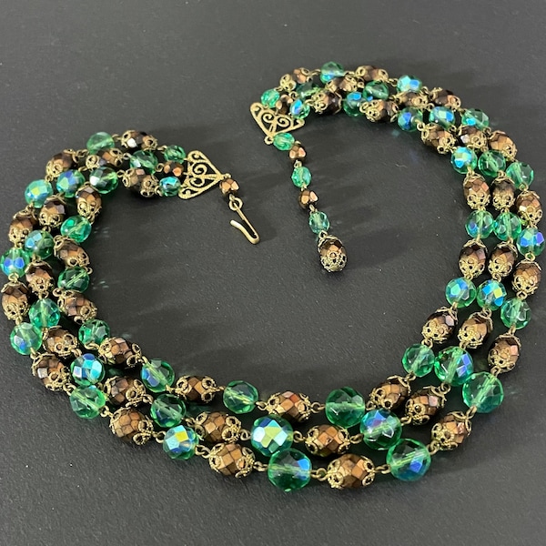 Vintage triple strand faceted glass beaded necklace, beautiful green and bronze aurora borealis coated beads with filigree bead caps