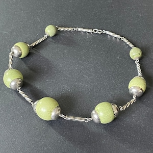 True vintage Art Deco silver tone chrome and light lime green wooden bead machine age chunky necklace, possible Jakob Bengel