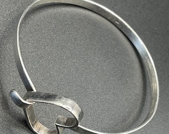 Vintage sterling silver torque bangles, one simple and classic, the other with a pretty heart shape