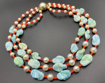 Vintage triple strand glass beaded necklace with moulded blue and white swirl glass, glass faux pearl beads & coral coloured glass beads