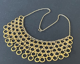 Vintage machine age Art Deco style gold tone bib statement necklace, chainmail mesh with gold tone circles / hoops