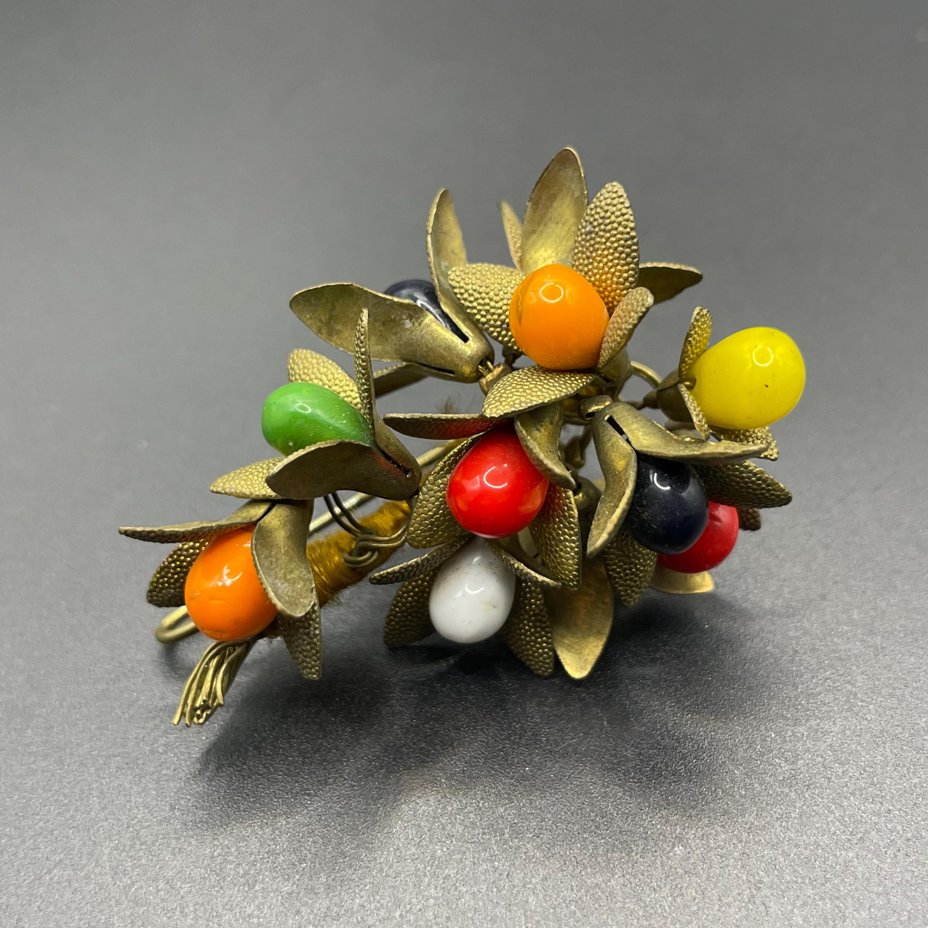 Belle broche en métal doré vintage (Années 70/80) MOVITEX