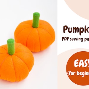 May include: Two orange felt pumpkins with green stems. The pumpkins are on a white background. The text "Pumpkin PDF sewing pattern EASY (for beginners)" is in the background.