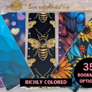 May include: A set of 35 colorful bookmark options. The bookmarks feature geometric patterns, abstract designs, floral patterns, and bees. The text "RICHLY COLORED" is printed on the bookmarks.