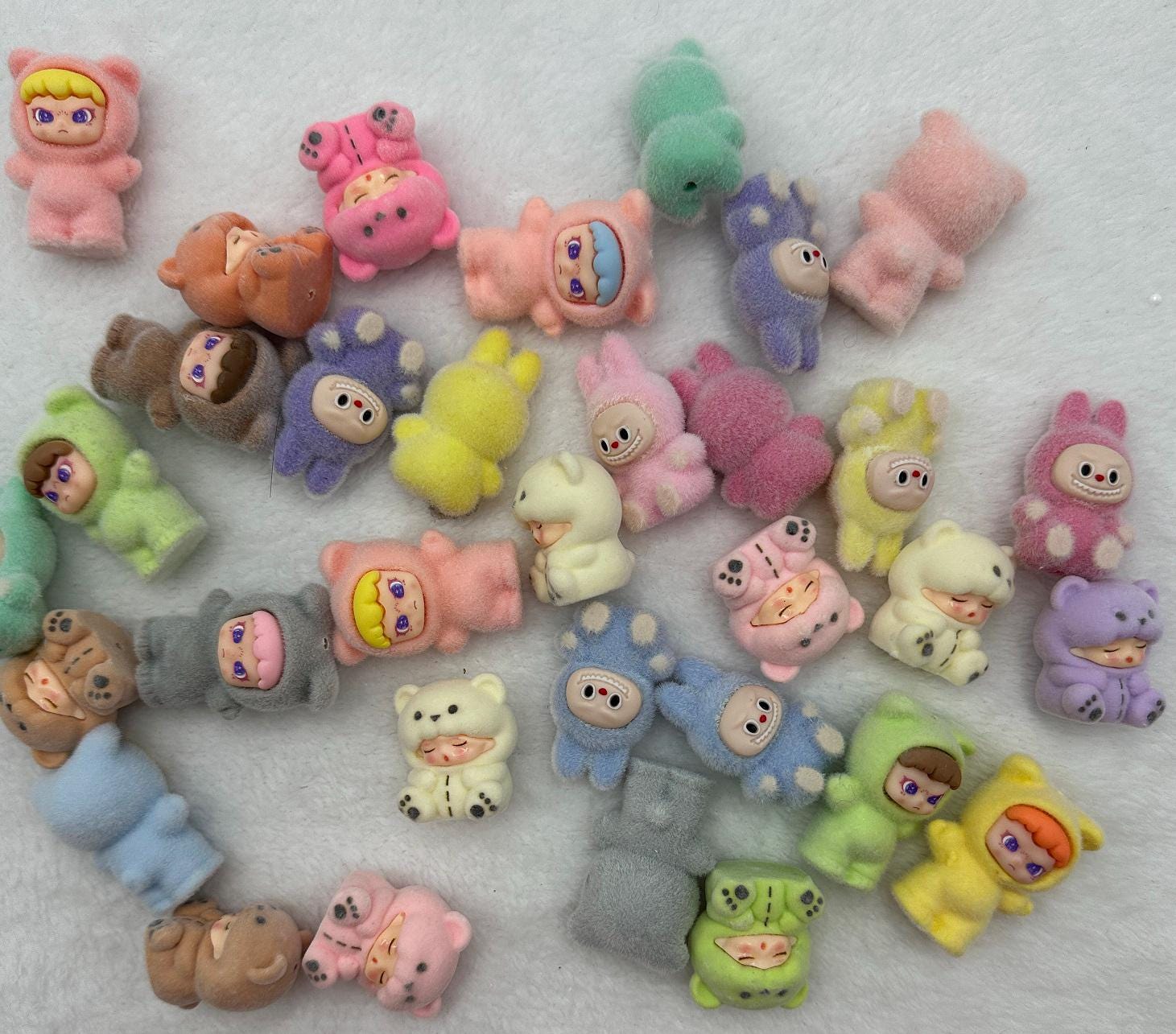 Flocked Beads, Flock Sleeping Babies, Flocked Angry Face Bunny, Flocked Angry Girl Face