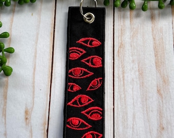Watchful Eyes Jet Tag Keychain