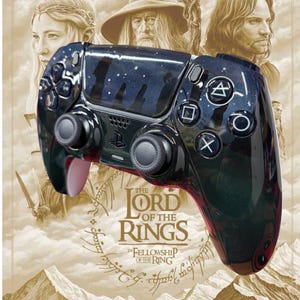 May include: A black wireless video game controller featuring a glossy finish with a dark starry night sky graphic and silhouettes of characters. The controller includes standard directional buttons, two analogue sticks, and the PlayStation logo.