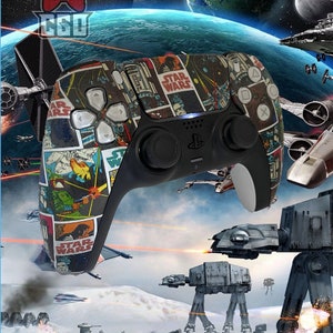 May include: A black PlayStation 5 DualSense controller with a Star Wars comic book design. The controller has a black and white design with a variety of Star Wars characters and scenes. The controller is set against a backdrop of a space scene with starships and planets.