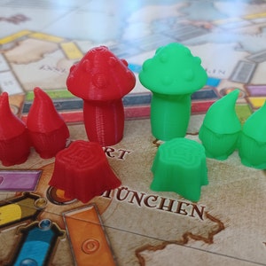 Elementy 3D z motywem orków i gnomów do gier takich jak Ticket to Ride