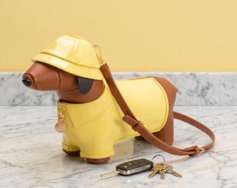 Bolsa transversal Dachshund | Capa de chuva amarela, couro vegano, bolsa kawaii com estampa de animal