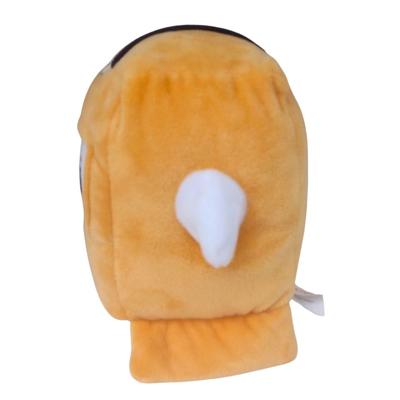May include: A plush toy shaped like a golden-yellow fish with a soft, fuzzy texture. The toy features a prominent white triangular fin protruding from its side and a flat, wide tail section at the bottom, with a small white tag visible on the side.