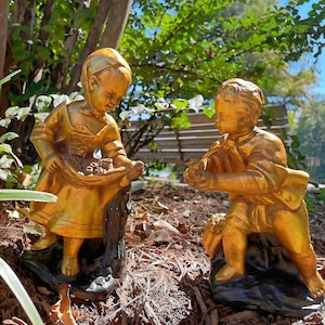 Boy and Girl Statues 