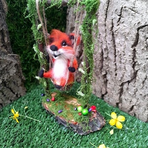 Felted fox on a swing. Felting decoration. Gift for mom. Needle felt animals
