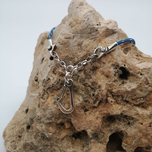 Sterling silver climbing reunion pendant.