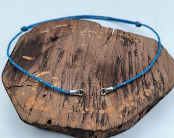 Adjustable cord for carabiner pendant