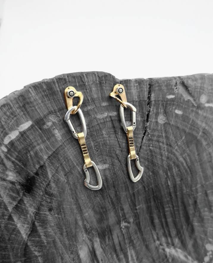 Gold and silver climbing express tape earrings
