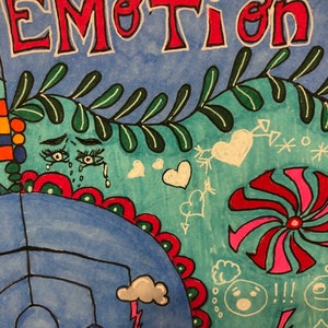 May include: A colorful drawing with the word "EMOTION" in red letters at the top. The drawing includes a blue sky with white clouds, a red and green flower, a red and pink pinwheel, and a white heart.