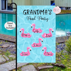 May include: A blue and white garden flag with the text "Grandma's Pool Party" and pink flamingo pool floats with names written on them.