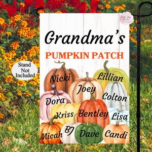 May include: A white wooden sign with the text "Grandma's Pumpkin Patch" and a collection of painted pumpkins with names like "Nicki", "Lillian", "Joey", "Colton", "Dora", "Kriss", "Bentley", "Lisa", "Micah", "Dave", and "Candi".