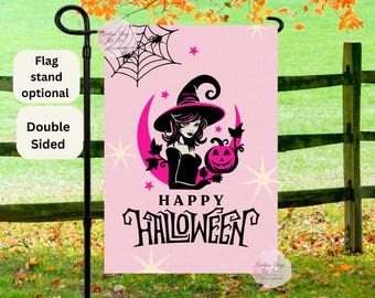 May include: A double-sided pink Halloween garden flag featuring a witch in a black dress and hat, holding a jack-o'-lantern. The flag has the words "Happy Halloween" in black script, with a spider web and stars. Flag stand optional.