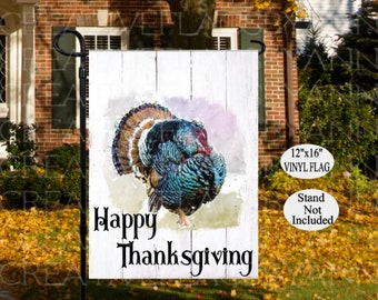 May include: A 12"x16" vinyl garden flag featuring a watercolor-style turkey illustration. The flag has a white wooden plank background with the words "Happy Thanksgiving" in black script. Stand not included.