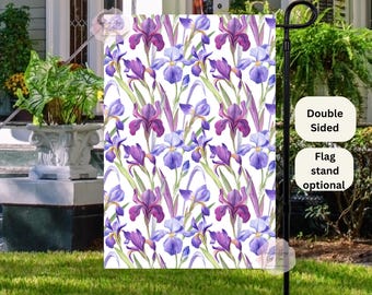 May include: Double-sided garden flag featuring a white background with a repeating pattern of purple and blue iris flowers.