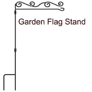 May include: Black metal garden flag stand with a decorative scroll design at the top. The stand is about 4 feet tall.