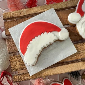 Santa hat PLA embosser, fondant stamp and matching cutter sugar paste, icing stamp