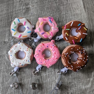 ERHACHAIJIA Maybe She's Complete Pink Glitter Badge Reel with Clip, Funny  Donut ID Card Badge Holder Gift for Nurses Doctor RN EN L&D OB Labor &  Delivery NICU Nurse OBGYN Midwife 