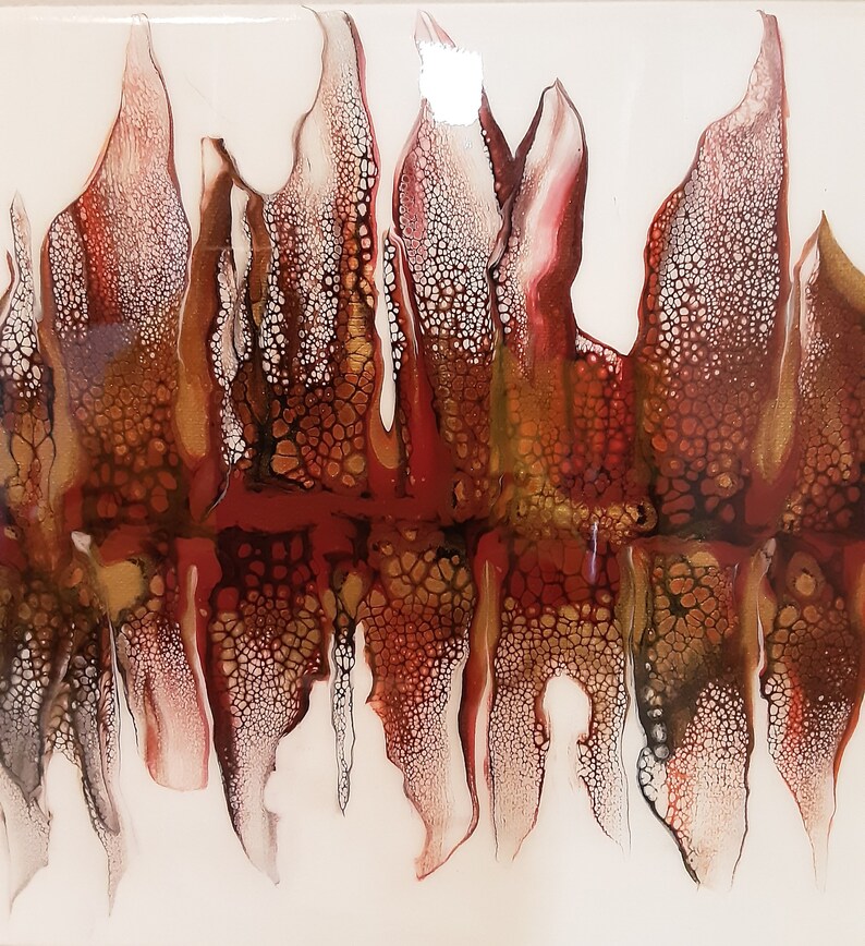 May include: Abstract painting with a white background and a design of red, brown, and gold flowing lines that resemble flames.