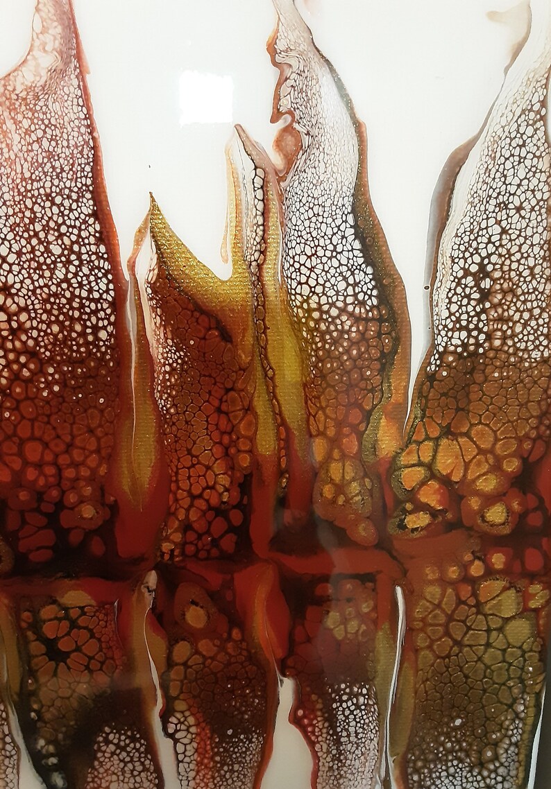 May include: Abstract painting with a white background and brown, gold, and red paint creating a flowing, organic pattern.