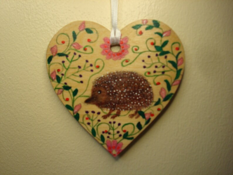 Hedgehog stroll hanging decoration.