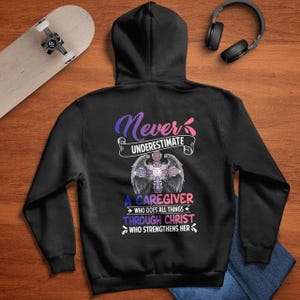 Caregiver Shirt,Gift For Caregiver, Caregiver Hoodie-Never Underestimate,A Caregiver Who Does All Things,Through Christ Who Strengthens Her.