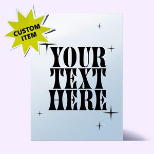 May include: A rectangular, light blue custom item with the text "YOUR TEXT HERE" in bold, black letters. A yellow starburst sticker with the words "CUSTOM ITEM" is in the upper left corner. Black starbursts are in the background.