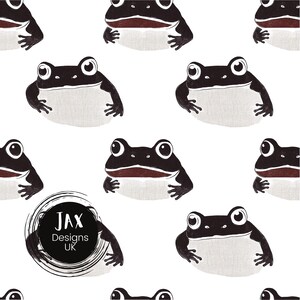 Può includere: Uno schema senza cuciture con illustrazioni in bianco e nero di rane con occhi grandi. Lo schema è su sfondo bianco e include il testo "JAX Designs UK".
