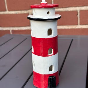 Handmade Ceramic Tealight Lighthouse.