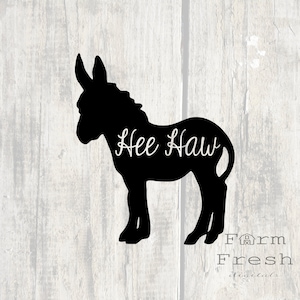 May include: Black silhouette of a donkey with the words "Hee Haw" written on its side. The words "Farm Fresh Digitals" are written below the donkey.