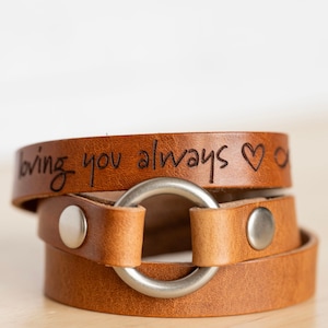 Exchangeable ring bracelet. Handmade to order leather bracelet. Allows you to change the ring out on the bracelet for any other standard ring. Personalize with an engraving outside and inside. Customize leather color, hardware color, size and engrave