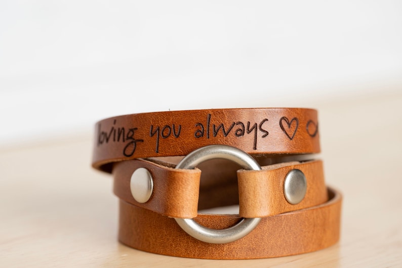 Exchangeable ring bracelet. Handmade to order leather bracelet. Allows you to change the ring out on the bracelet for any other standard ring. Personalize with an engraving outside and inside. Customize leather color, hardware color, size and engrave