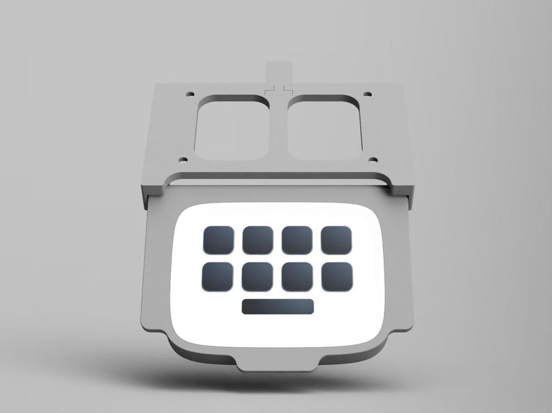May include: A white, rectangular, plastic keyboard with a gray frame and a gray top. The keyboard has 10 black keys and a long black space bar.