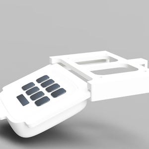 May include: White plastic keypad with a number pad and a long rectangular button. The keypad is attached to a white plastic base with two rectangular openings.