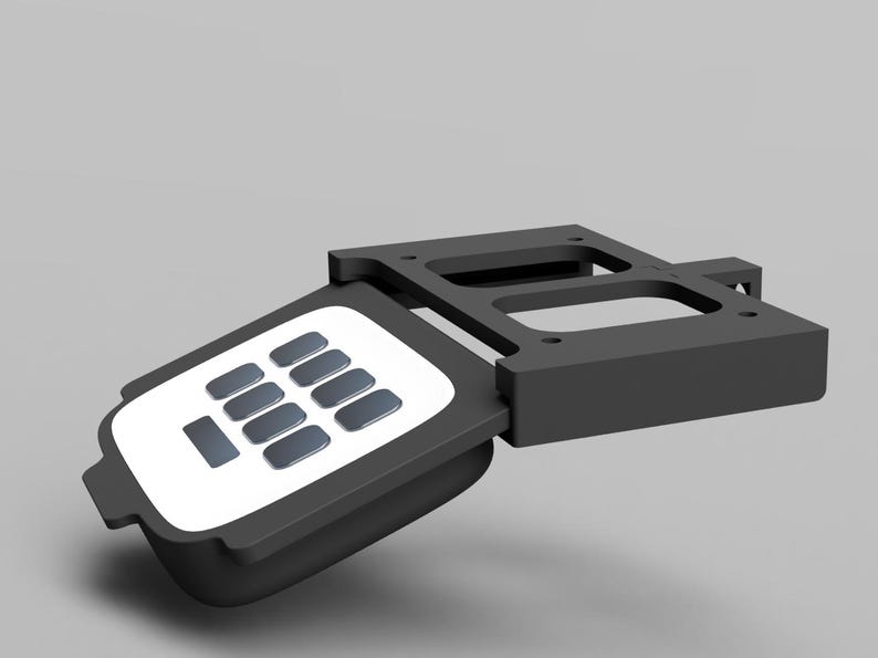 May include: A black and white keypad with a white background and black buttons. The keypad is attached to a black metal frame.