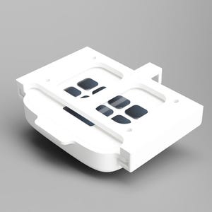 May include: White plastic case with a grid of small, rectangular openings. The case is designed to hold and protect small items.
