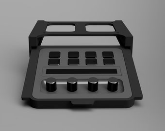 May include: Black electronic device with a gray faceplate. The device has six black buttons, a small black screen, and four black knobs.