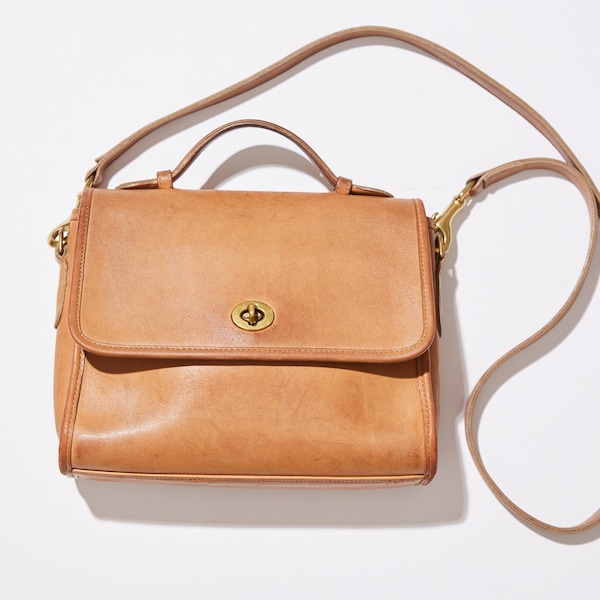 Coach Court bag #9870 in the Color Tan Honey. Made in late 1980s in United States. Turn Lock Flap Closure and Top Handle