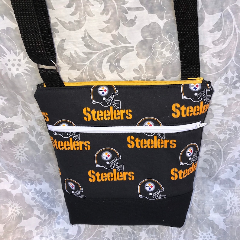 Pittsburgh Steelers Crossbody BagPurse Front Zipper Pocket and Adjustable Strap Black Helmet on Black with Secure Zipper Closure