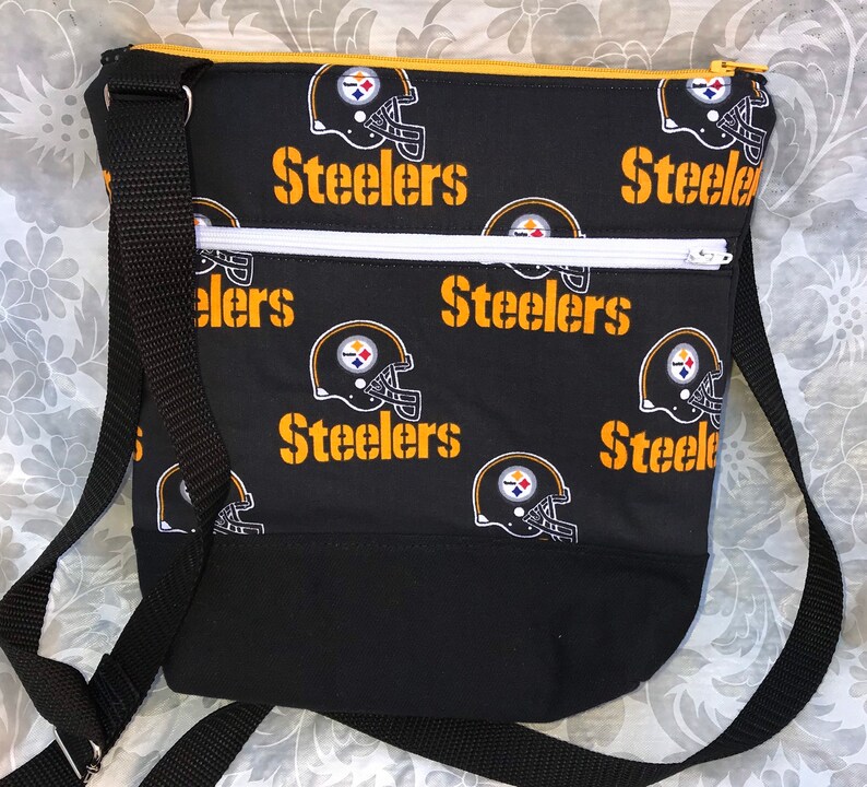 Pittsburgh Steelers Crossbody BagPurse Front Zipper Pocket and Adjustable Strap Black Helmet on Black with Secure Zipper Closure